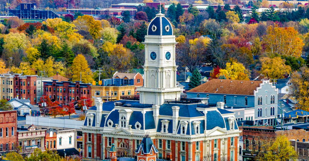 Noblesville, Indiana cityscape featuring historic courthouse surrounded by autumn foliage and local businesses, highlighting the importance of a strong online presence for local enterprises.